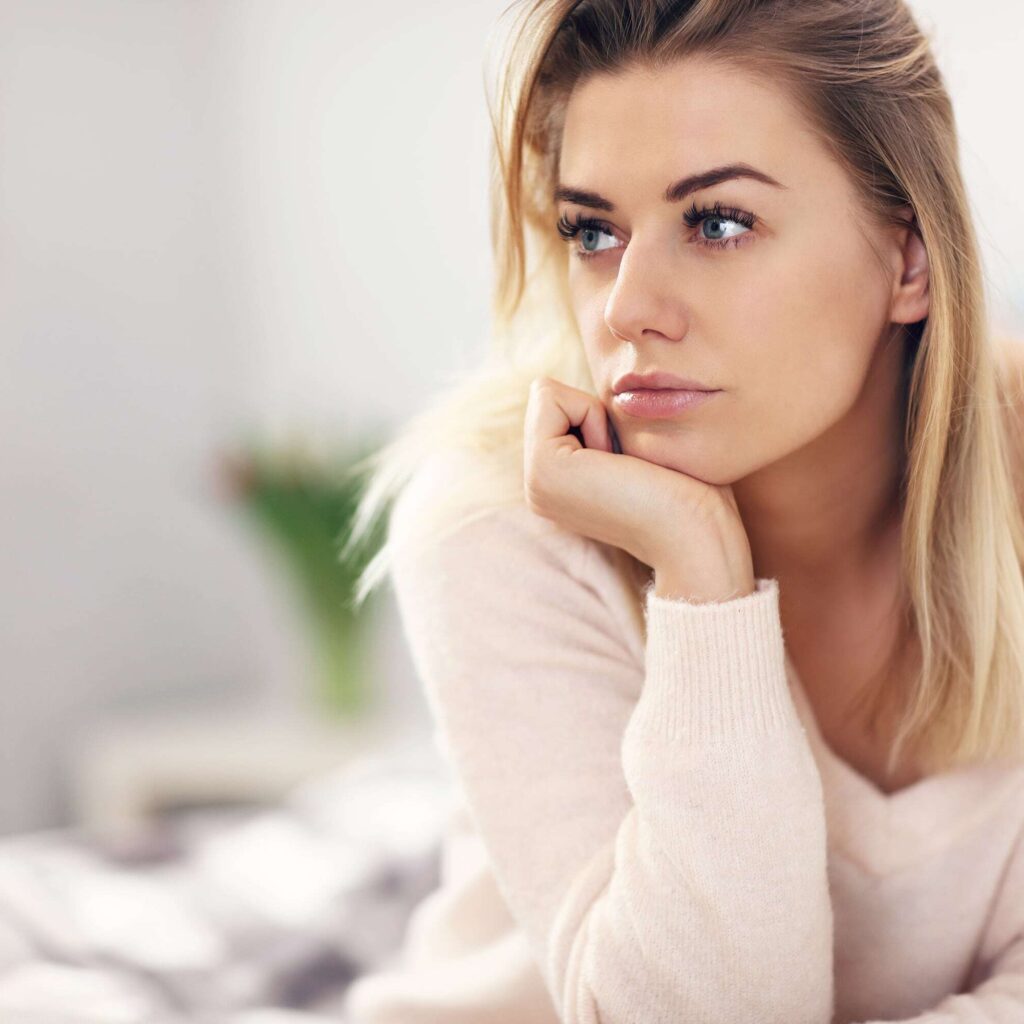 woman thinking about painful sex
